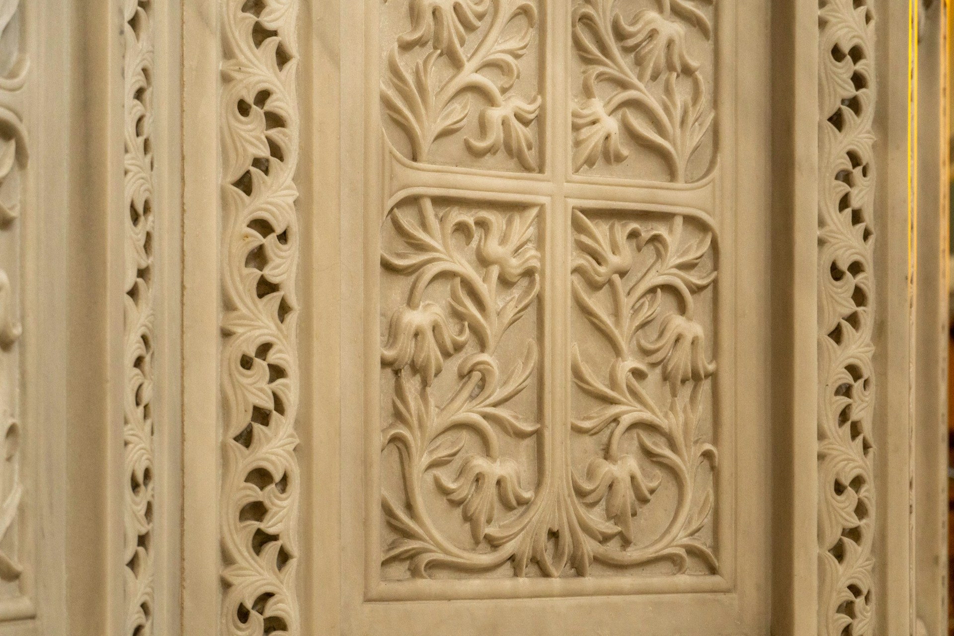 A beautifully inlaid stone artwork showcasing detailed craftsmanship and vibrant colors.