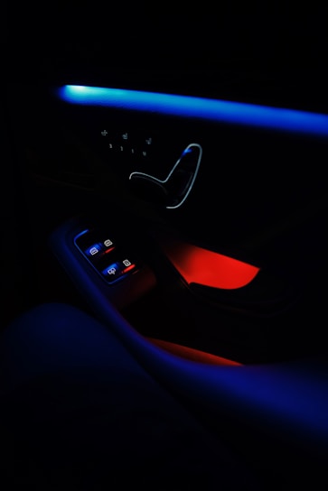 a close up of a car dashboard in the dark
