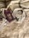 A beautifully arranged gift basket filled with sensory-friendly toys and cozy items.