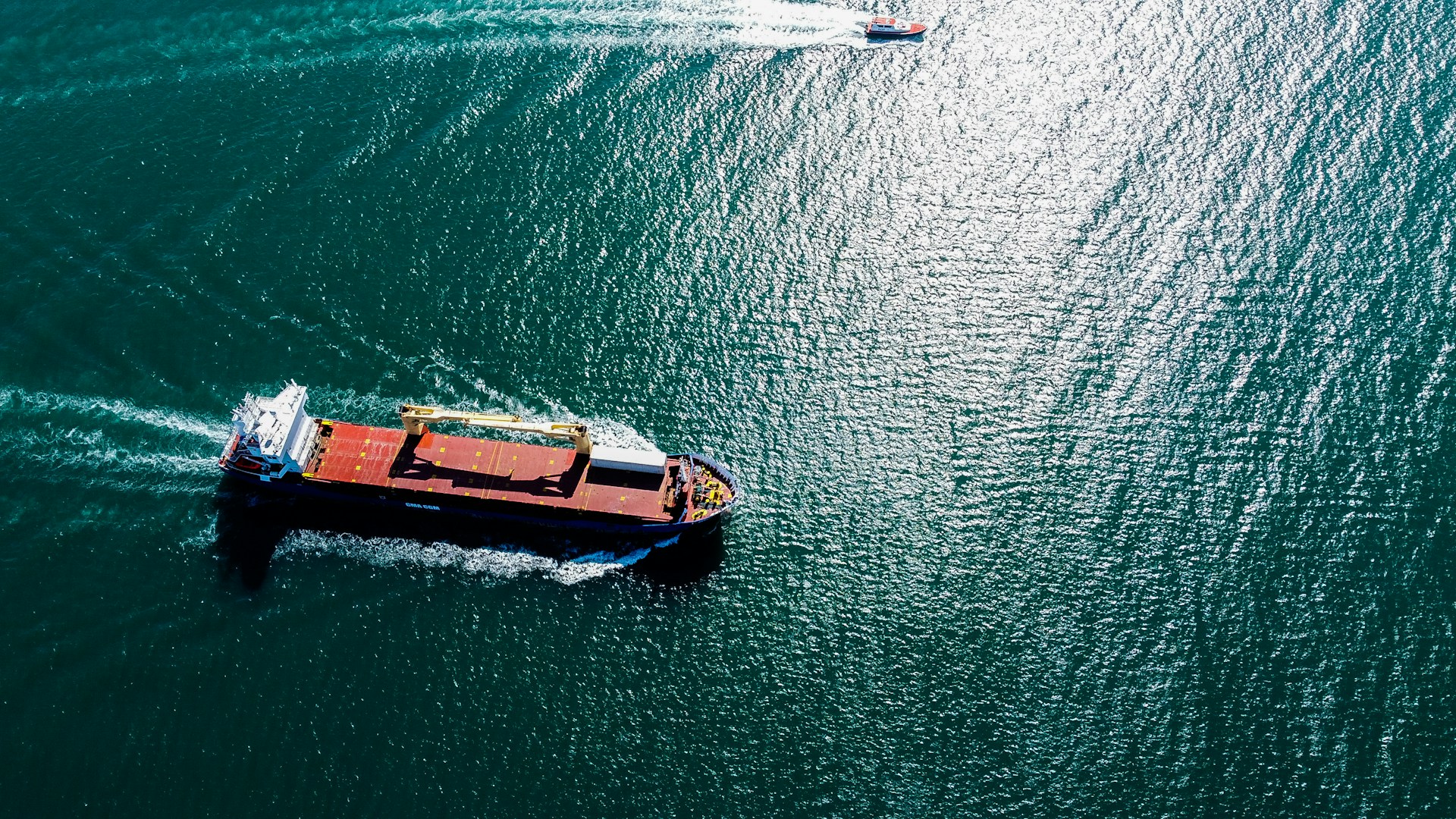 a boat traveling across a large body of water