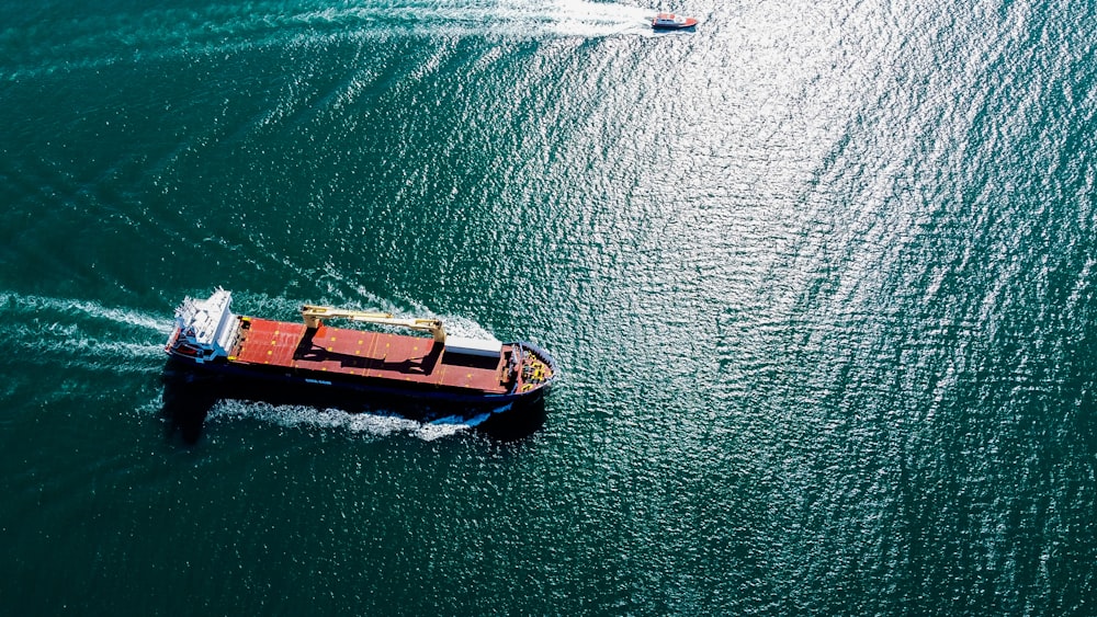 a boat traveling across a large body of water