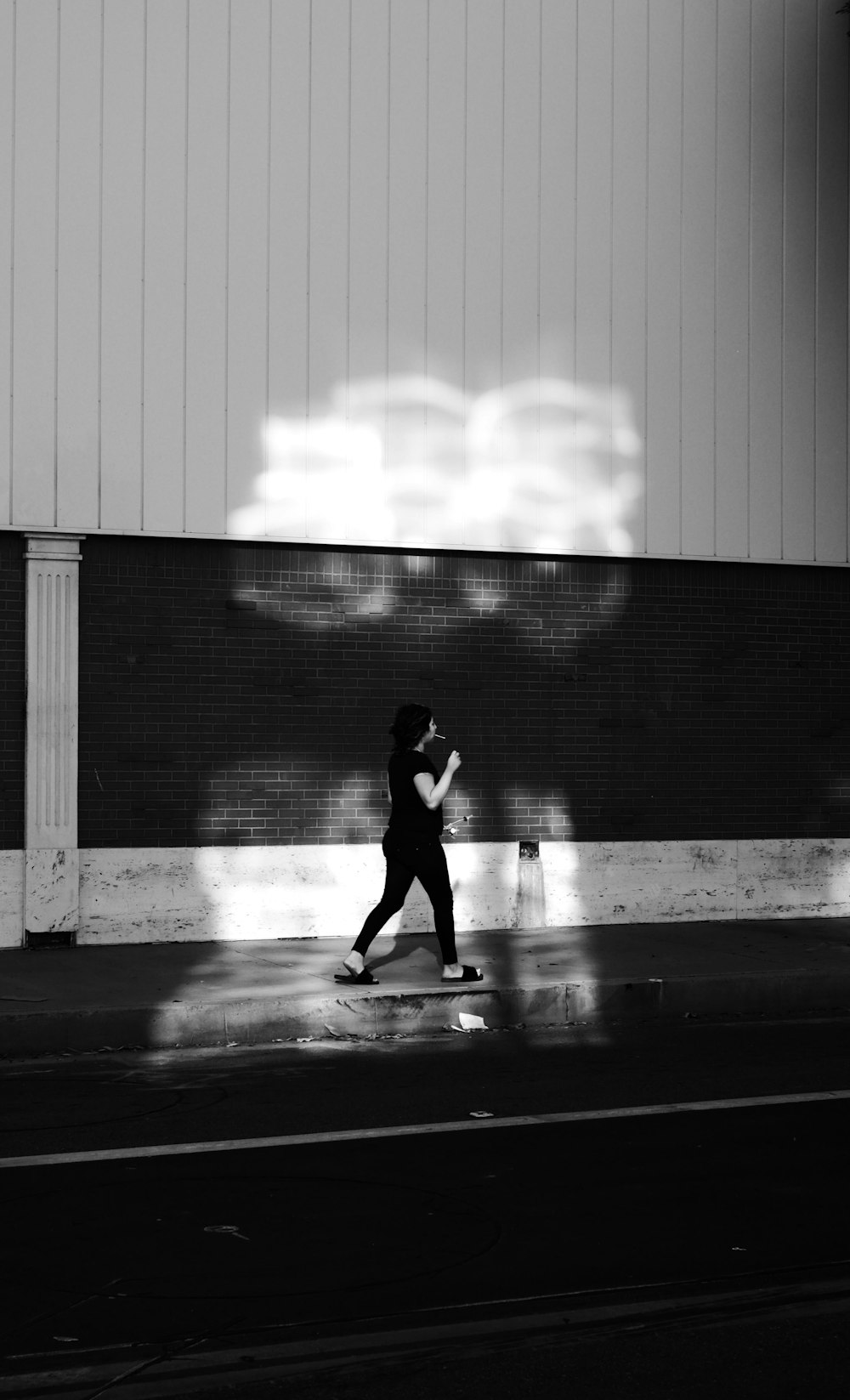 a person riding a skateboard on a city street