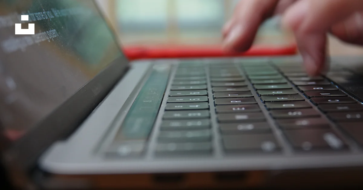 Letter Writing In Computer A close up of a person typing on a laptop photo – Free Computer Image ...