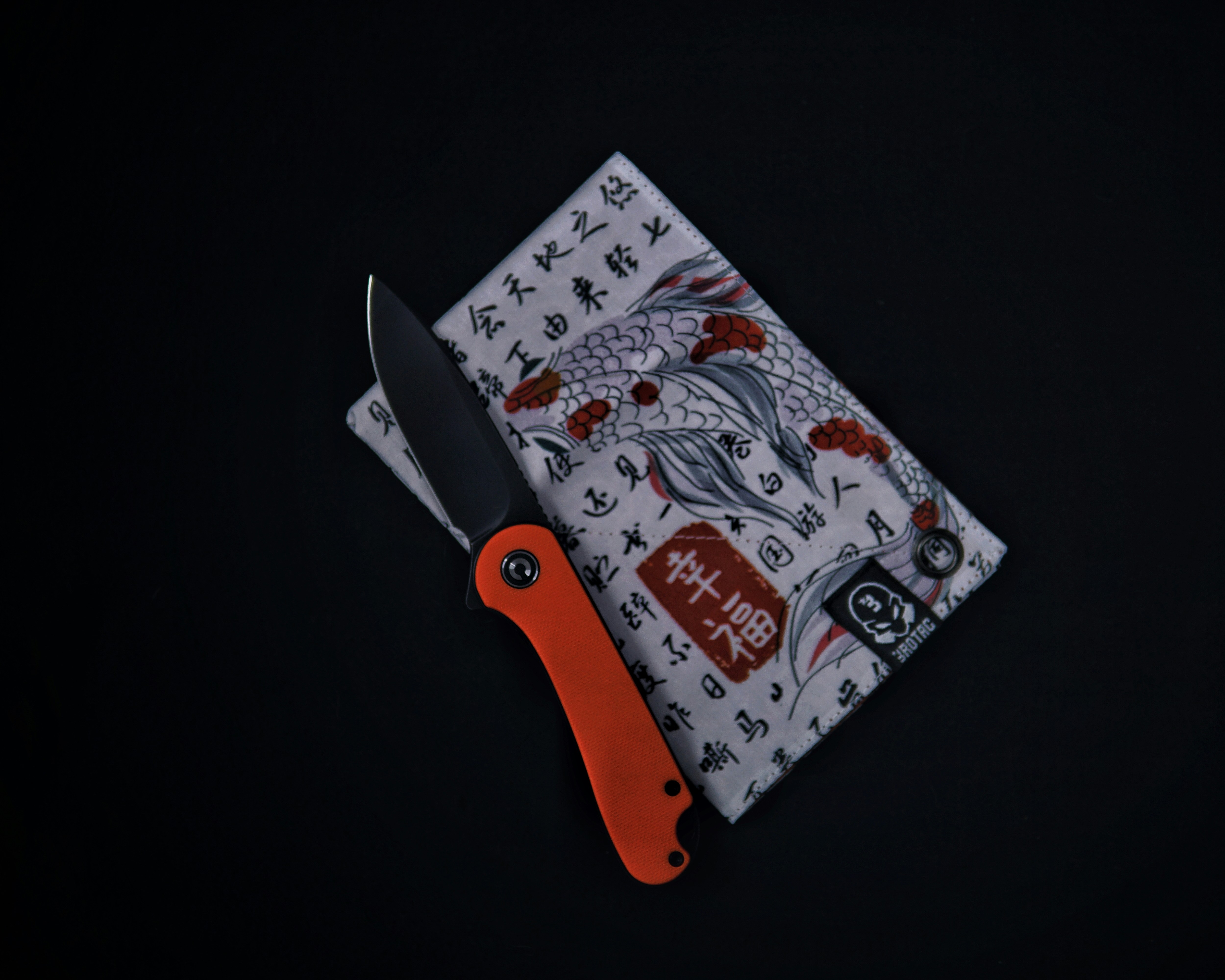 a pair of scissors sitting on top of a napkin