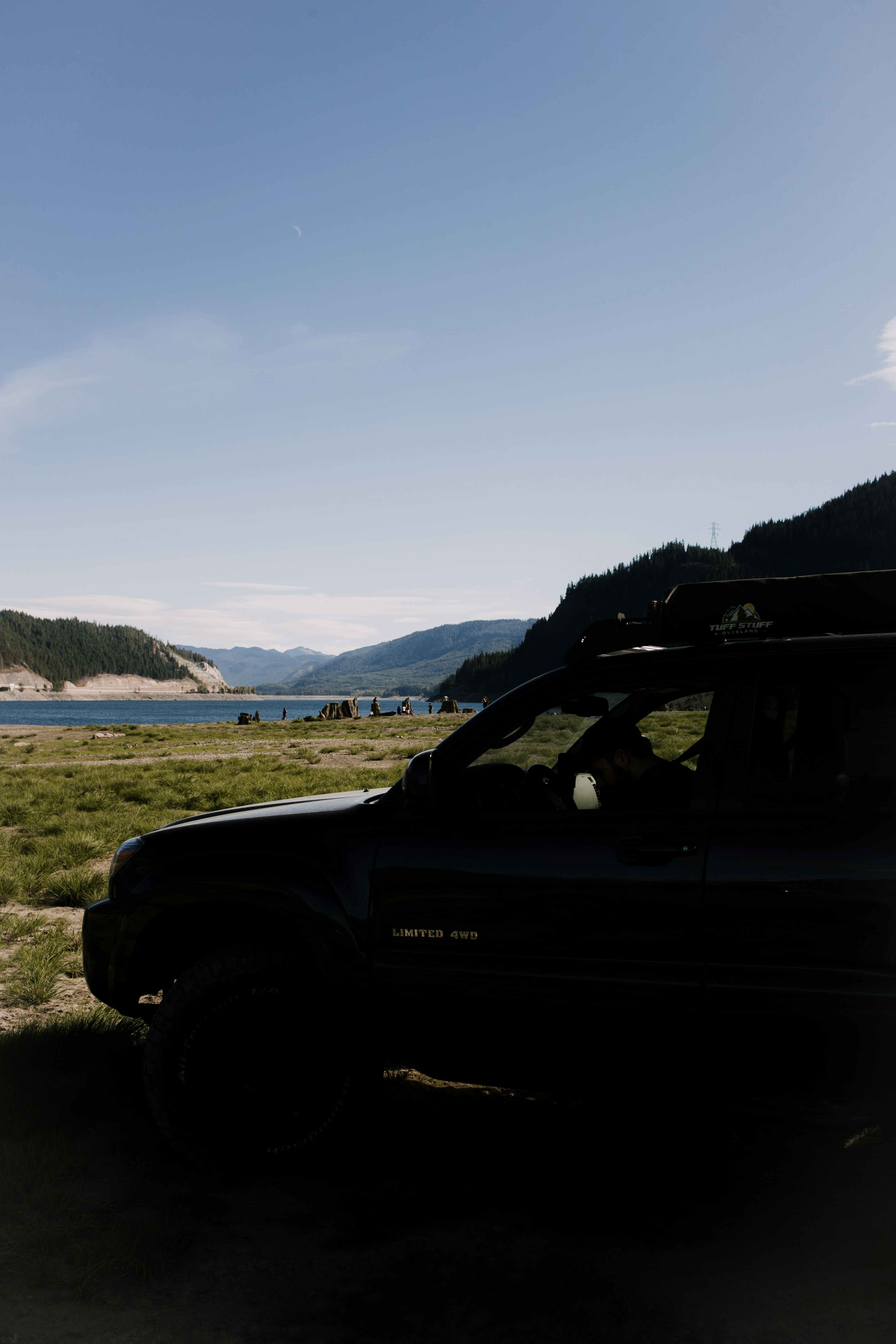 a car parked on the side of a hill