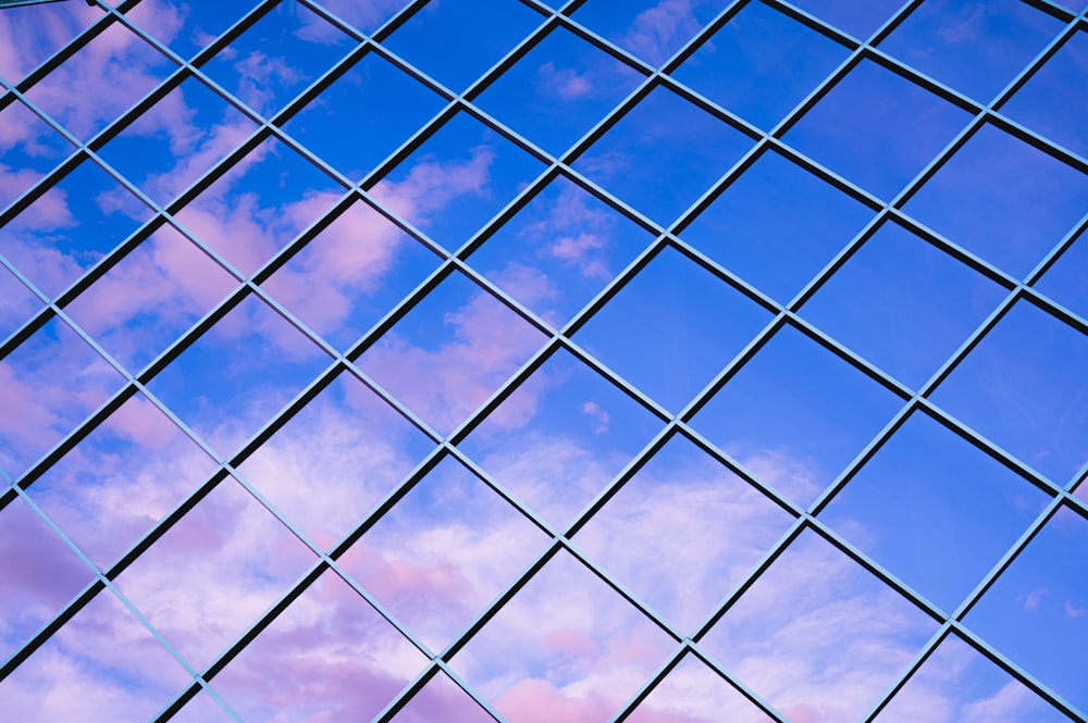 a view of the sky through a glass window photo – Free Calgary Image on  Unsplash