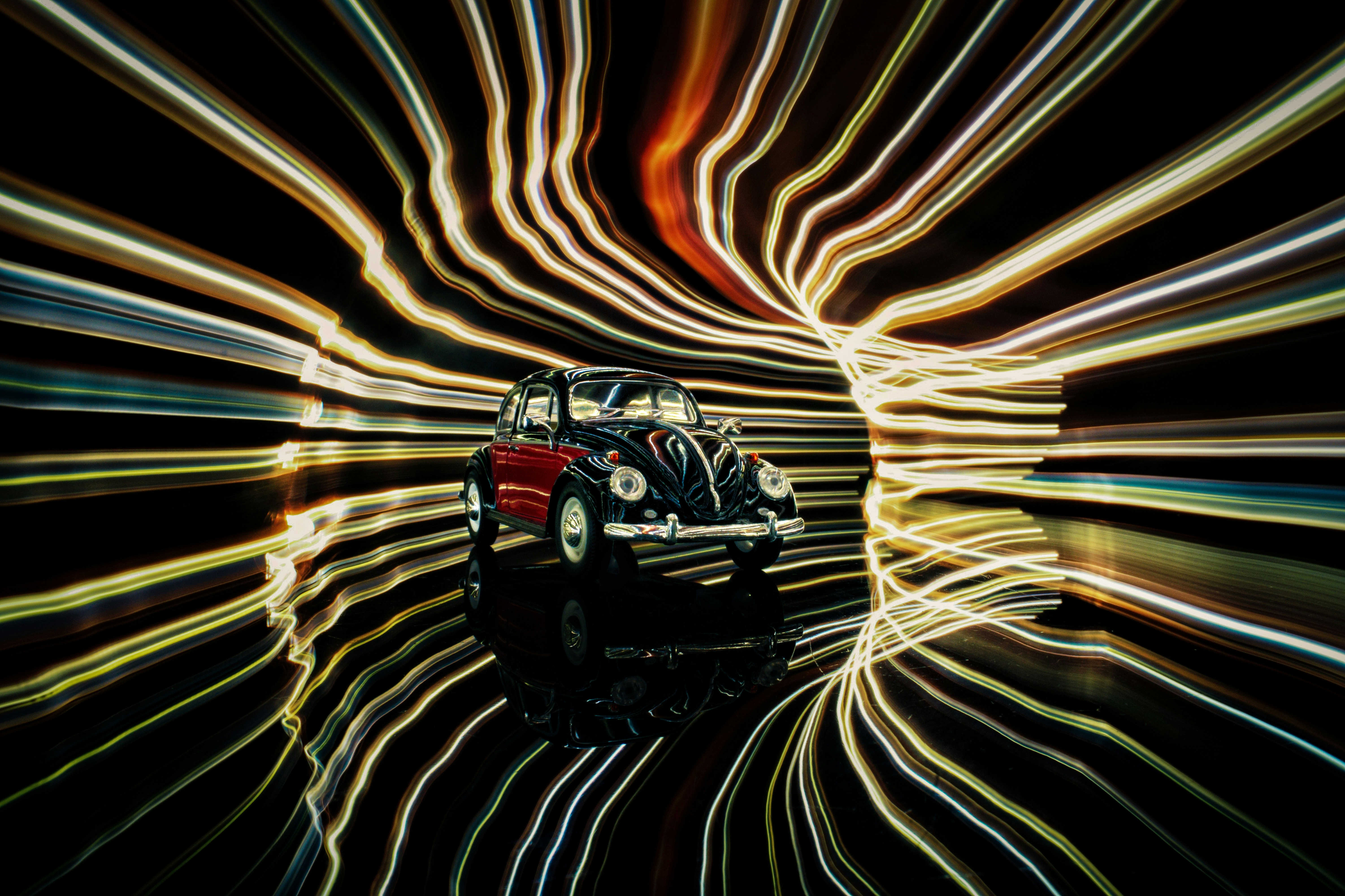 a car driving through a tunnel of light