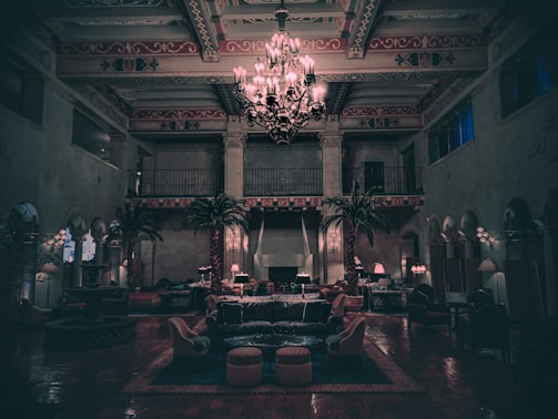 A panoramic view of a luxury hospitality space infused with Brazilian design elements and warm lighting.