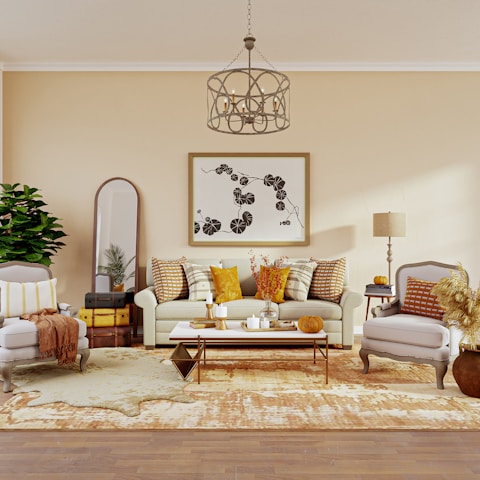 A warm, inviting living room decorated for autumn with soft blankets, pumpkins, and twinkling lights.