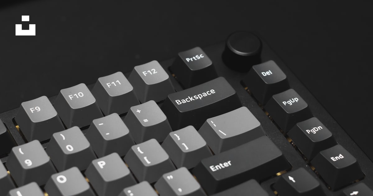 A close up of a keyboard on a table photo – Free Keyboards Image on ...