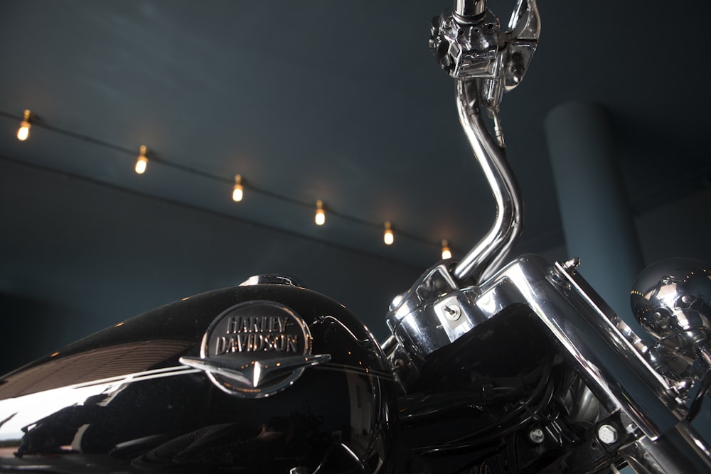 a close up of a shiny black motorcycle