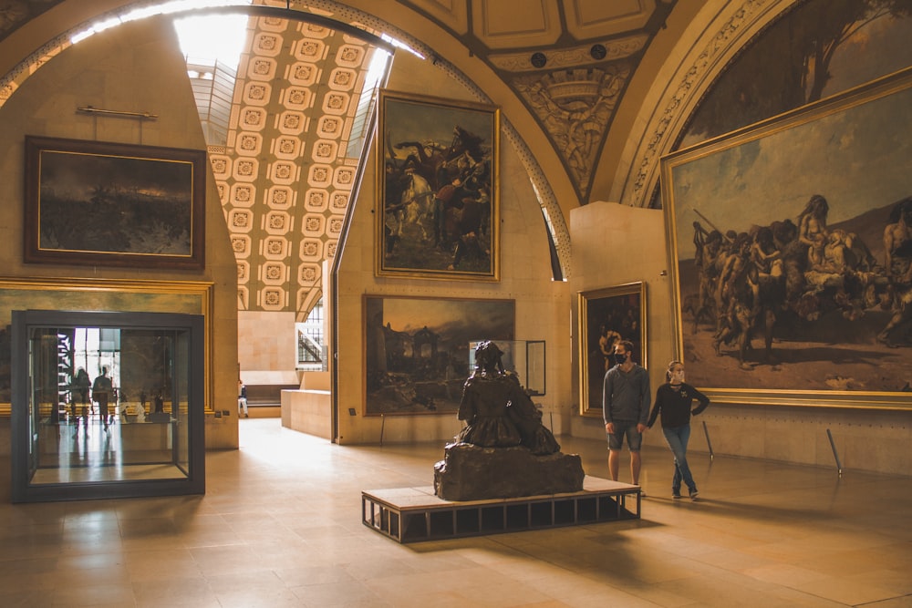 a couple of people that are standing in a room