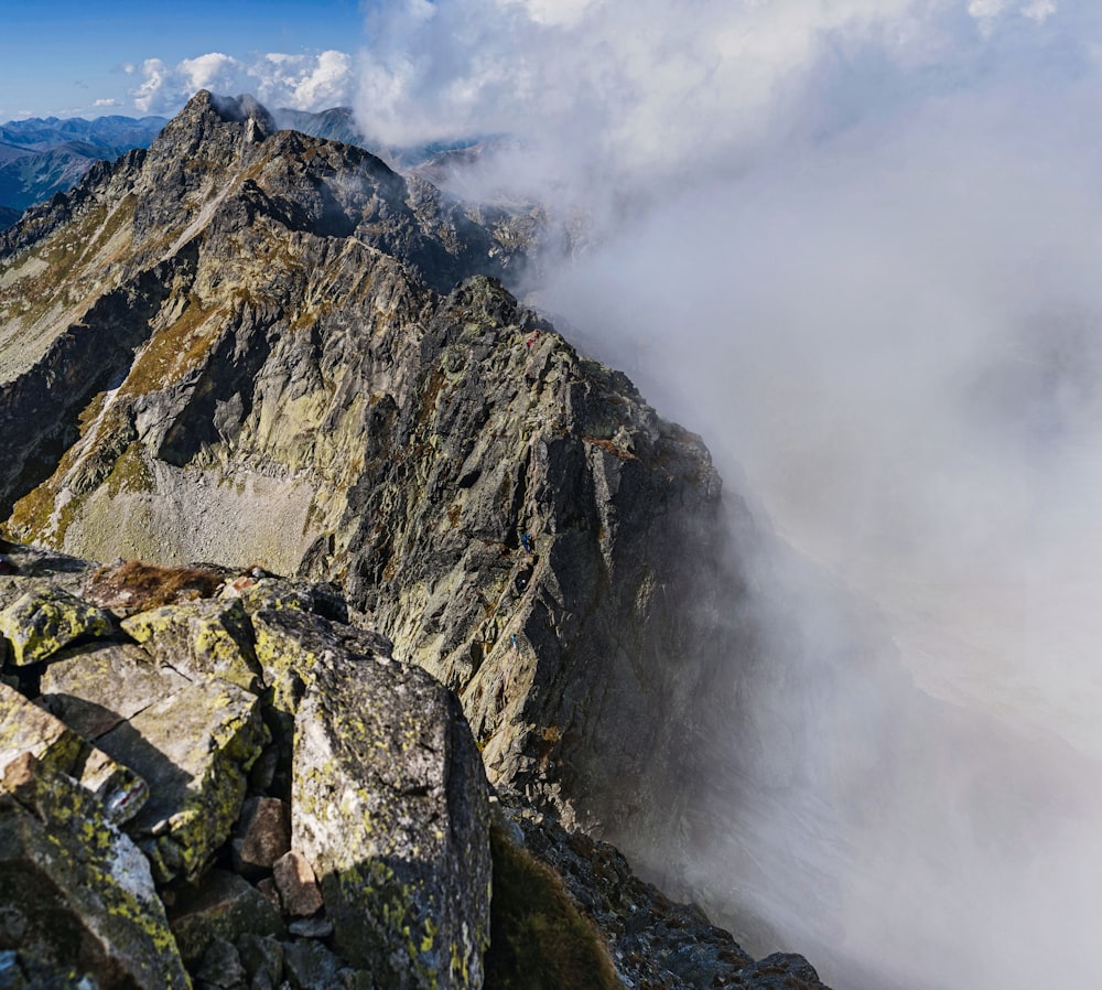 a person standing on top of a mountain