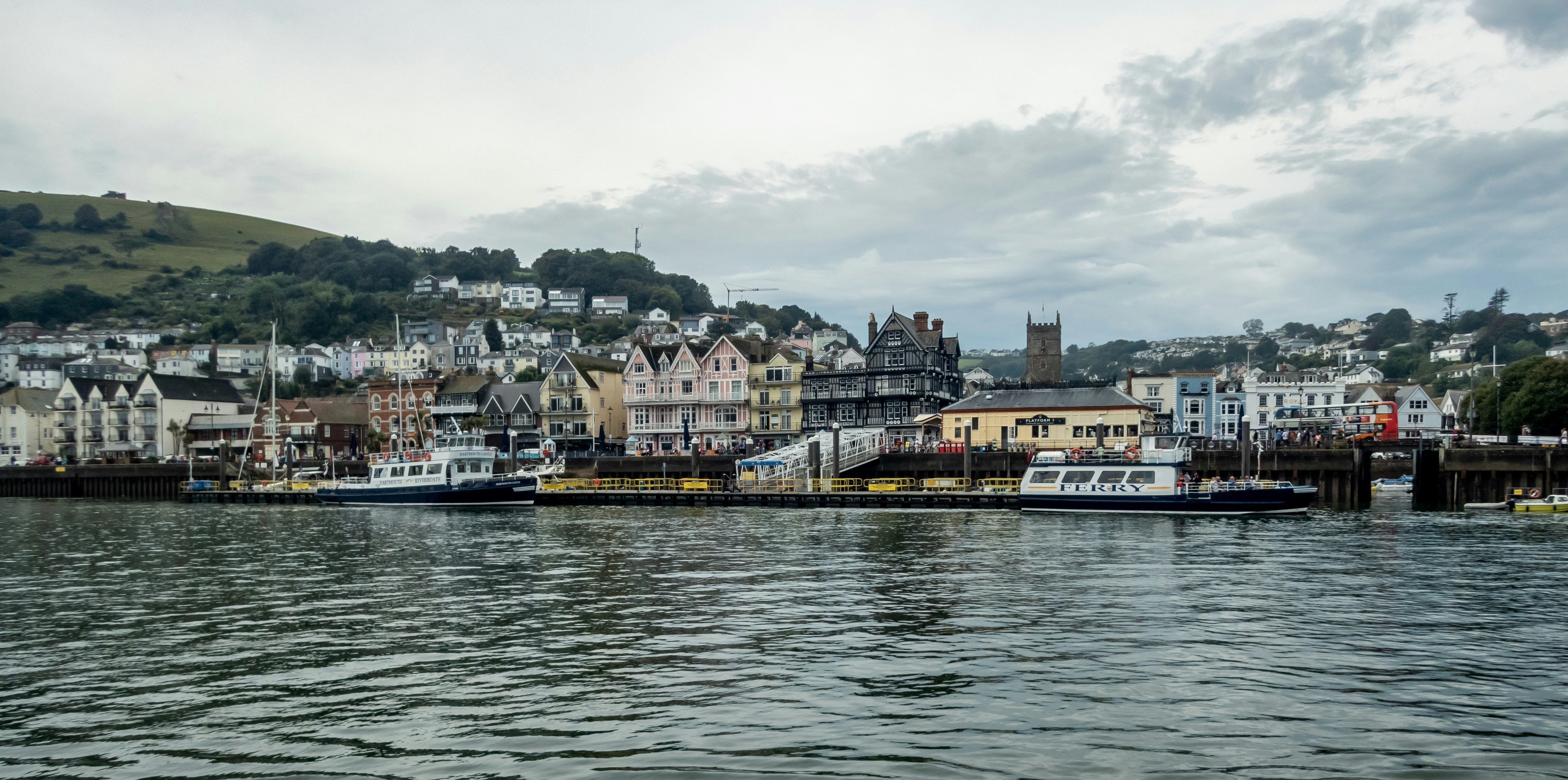 a body of water with a bunch of boats in it