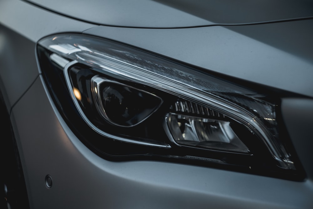 a close up of the headlight of a car