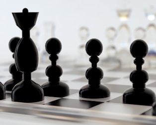 a close up of a chess board with pieces on it