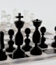 a black and white chess board with a cross on it