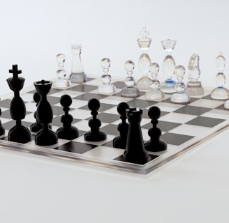 a glass chess board with black pieces on it