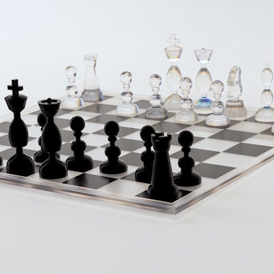 a glass chess board with black pieces on it