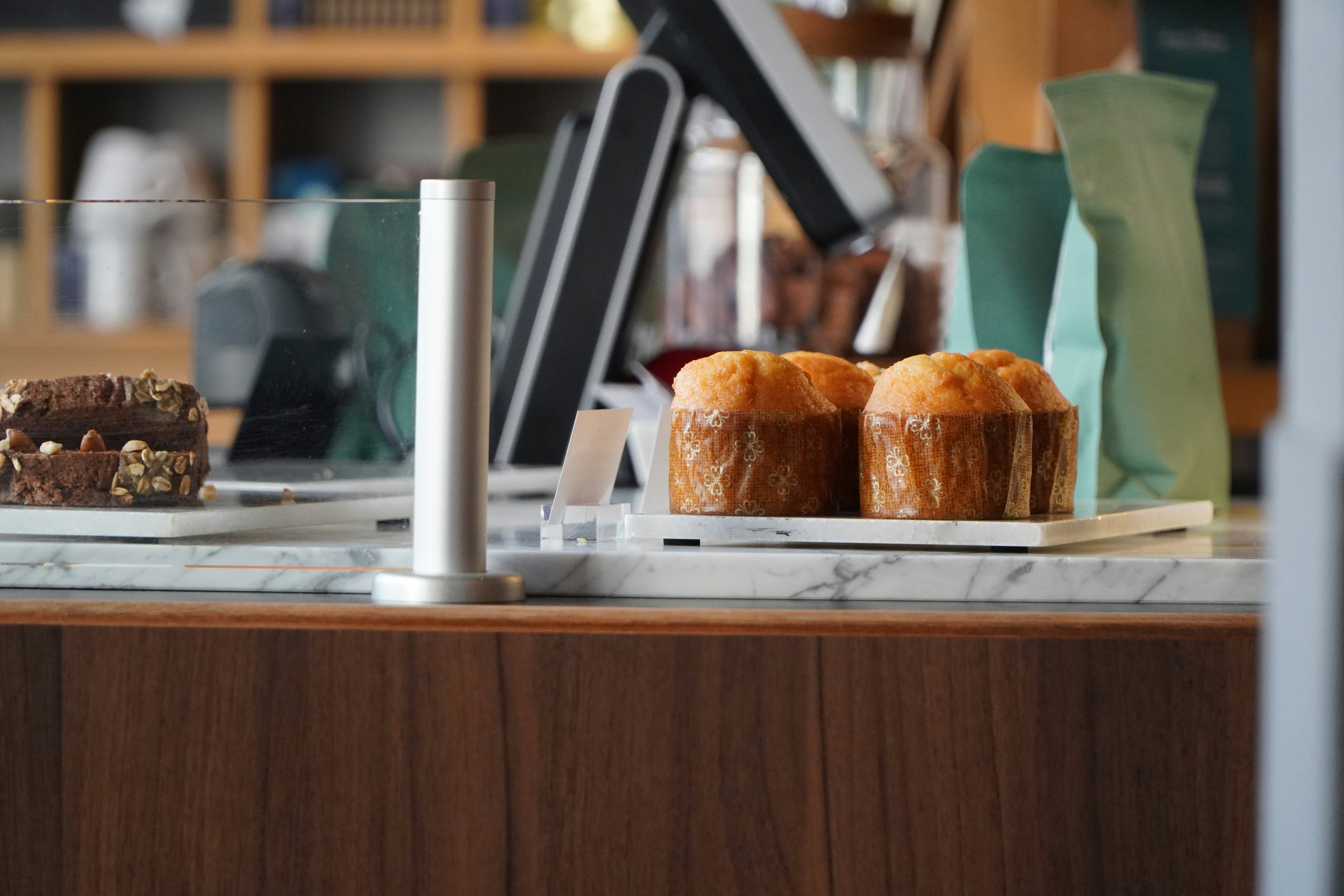 a couple of cakes sitting on top of a counter