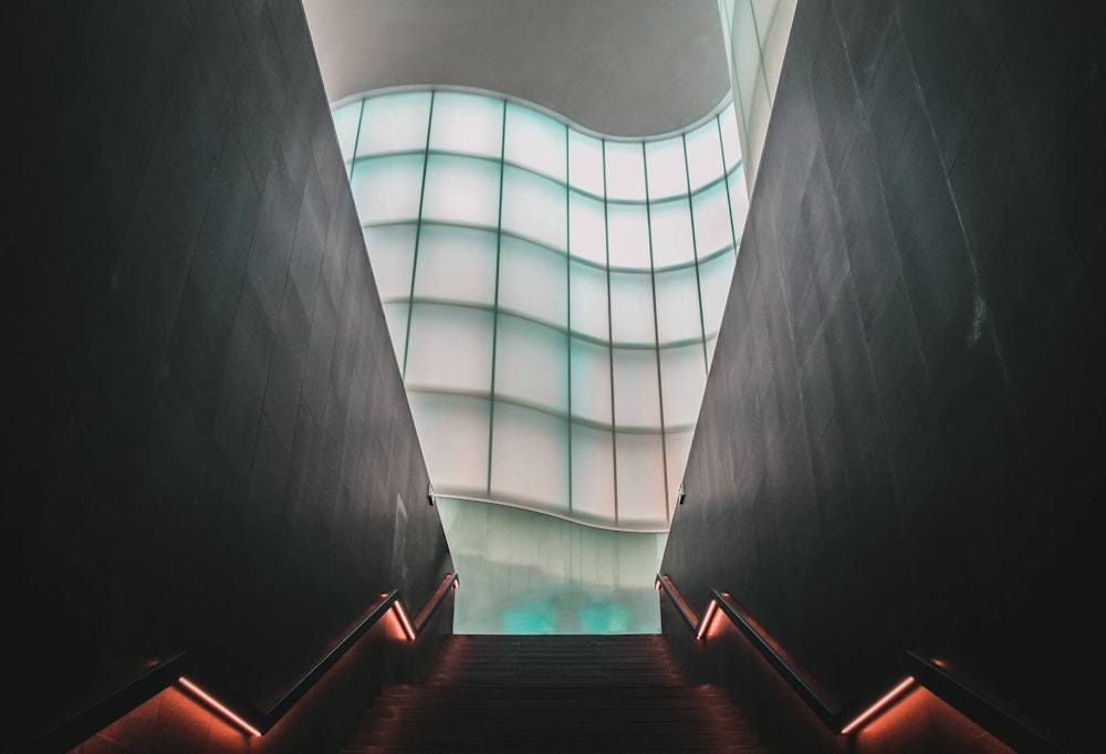 a staircase leading to a skylight in a building