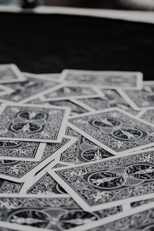 a pile of twenty dollar bills sitting on top of a table