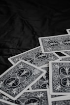 An assortment of premium playing cards arranged artistically on a sleek surface.