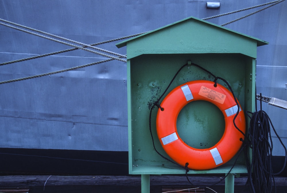 a life preserver in front of a large ship