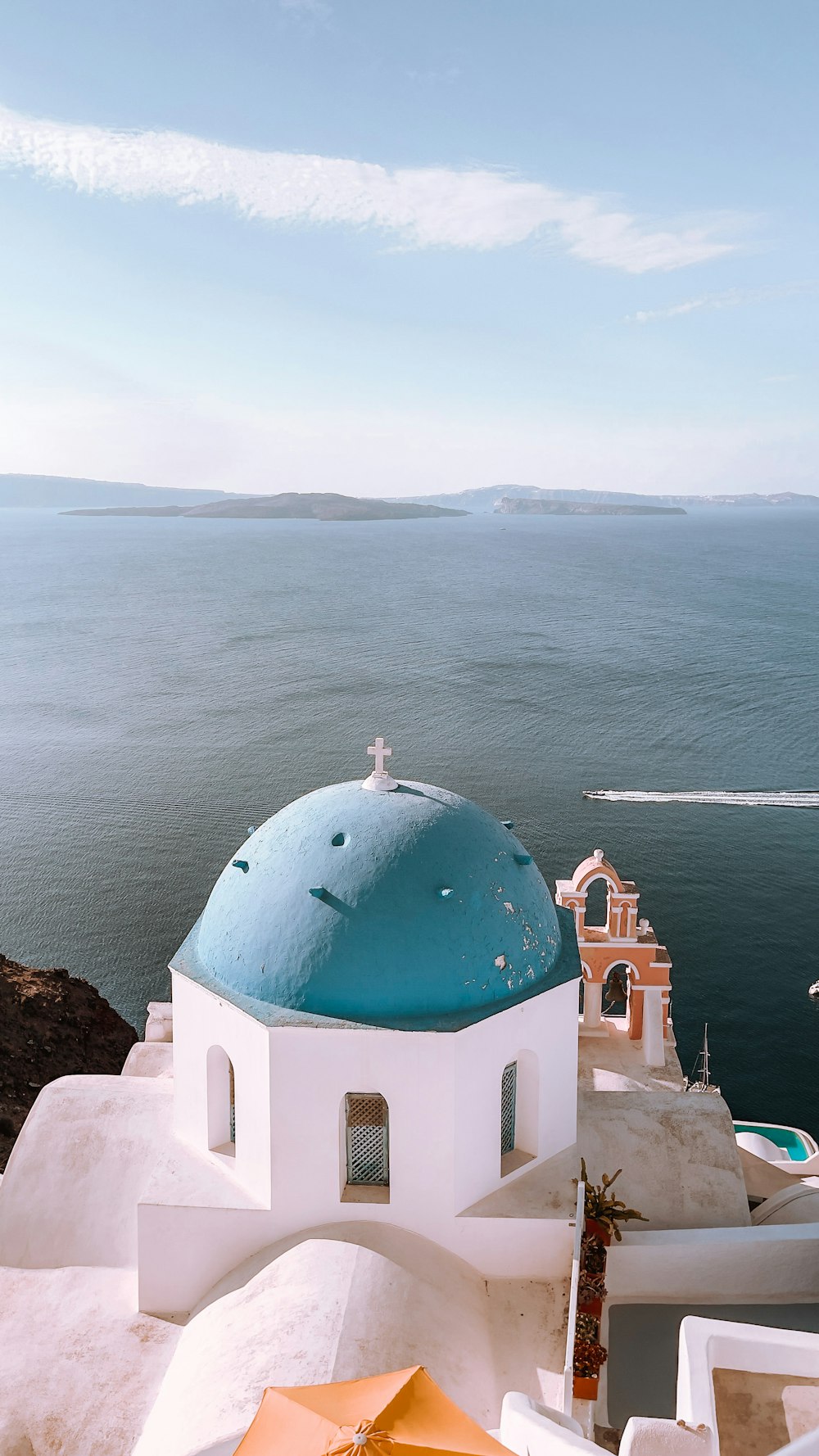 a blue dome on top of a white building