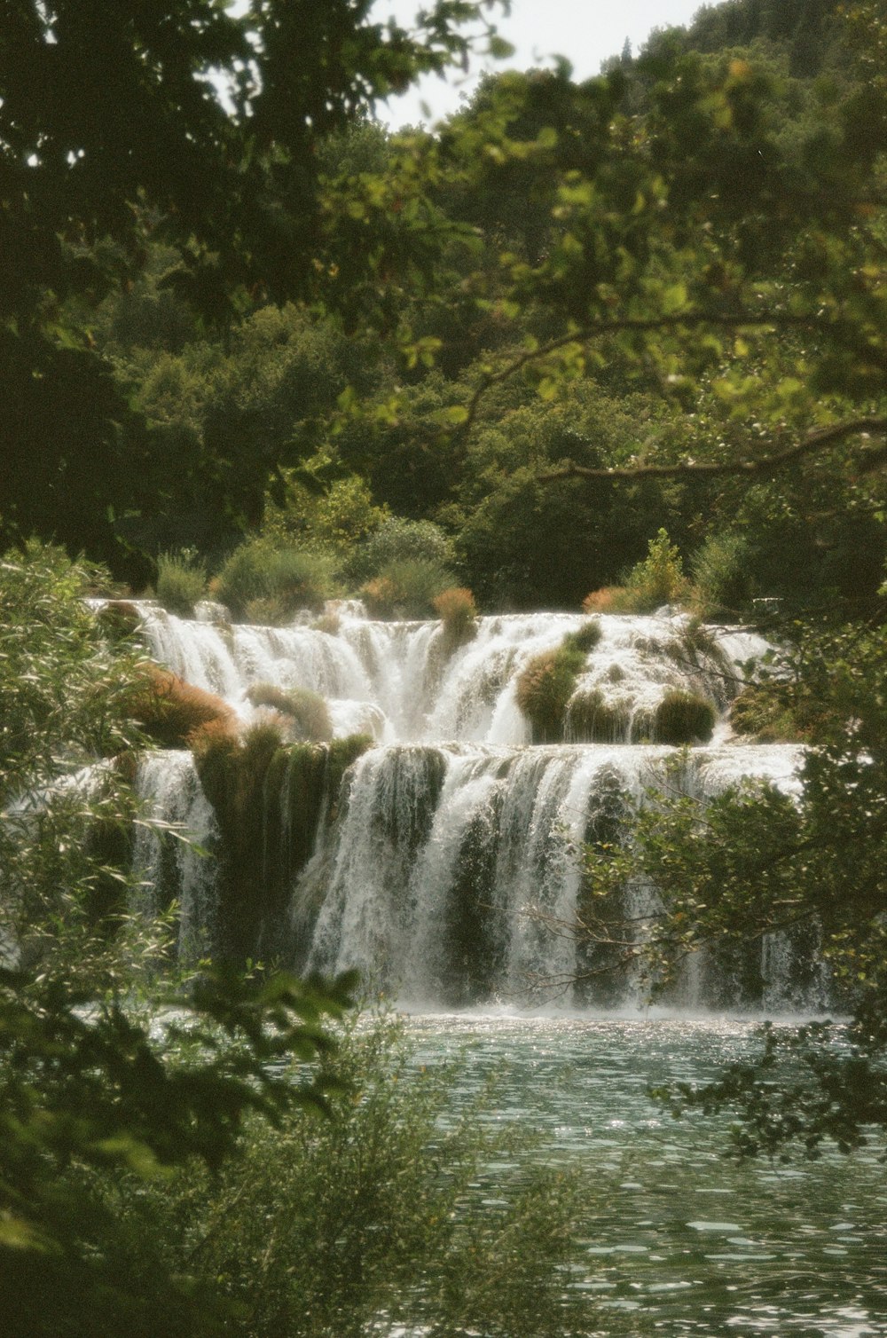 a large waterfall with lots of water coming out of it