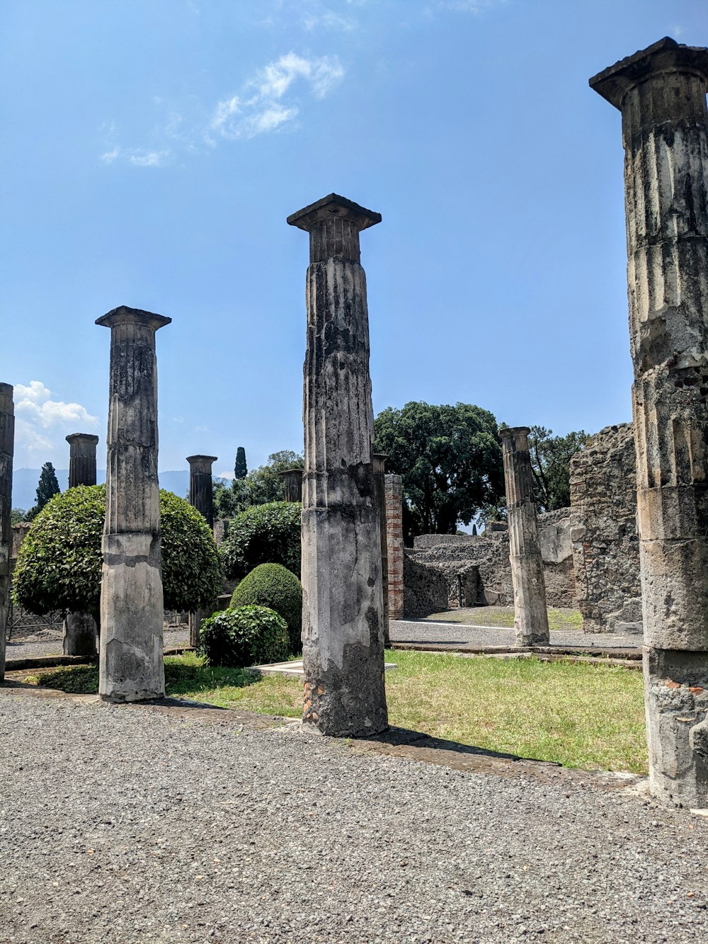 a group of stone pillars sitting next to each other
