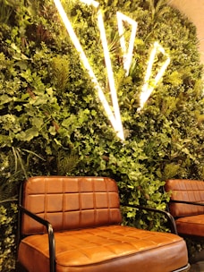 Lush green rooftop garden with integrated seating and soft lighting.