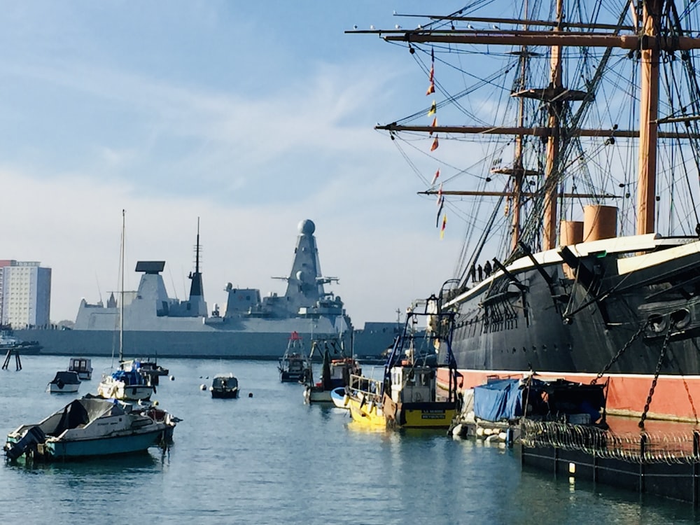 a group of boats that are sitting in the water