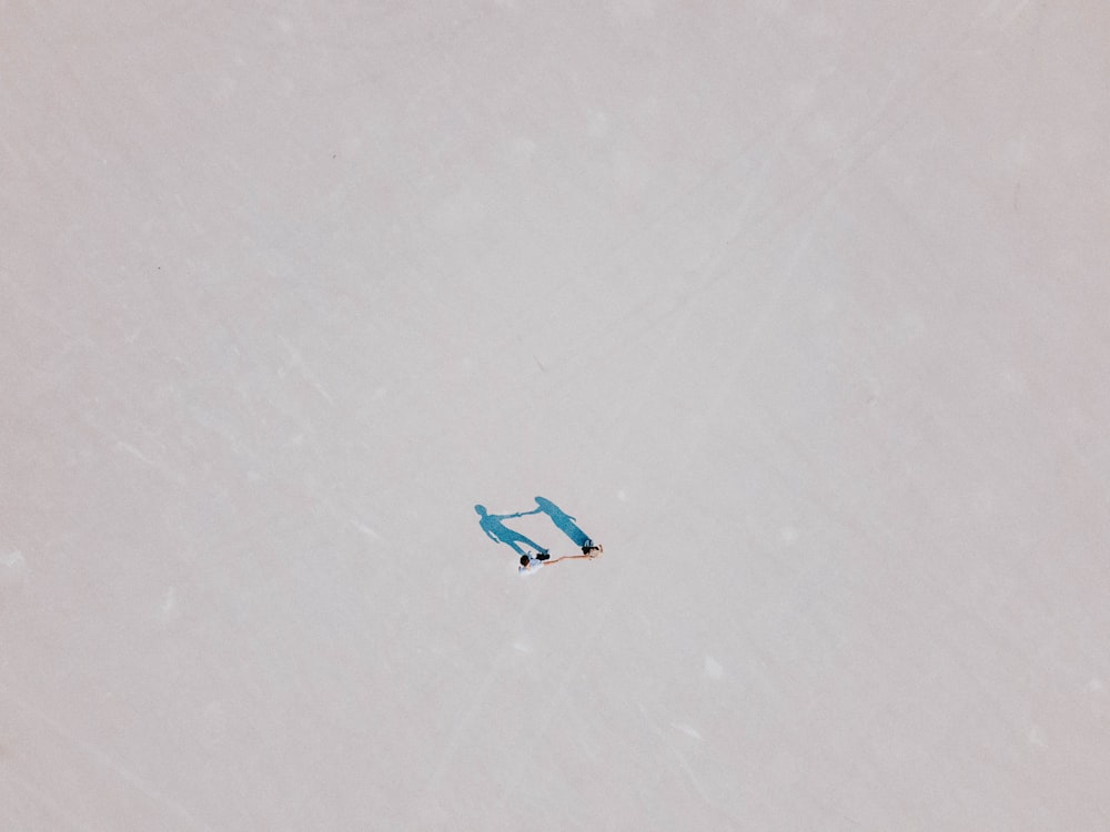 a person on a snowboard in the snow