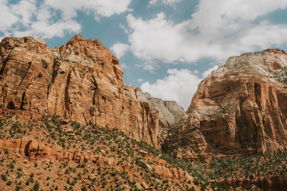 a rocky mountain with a sky background