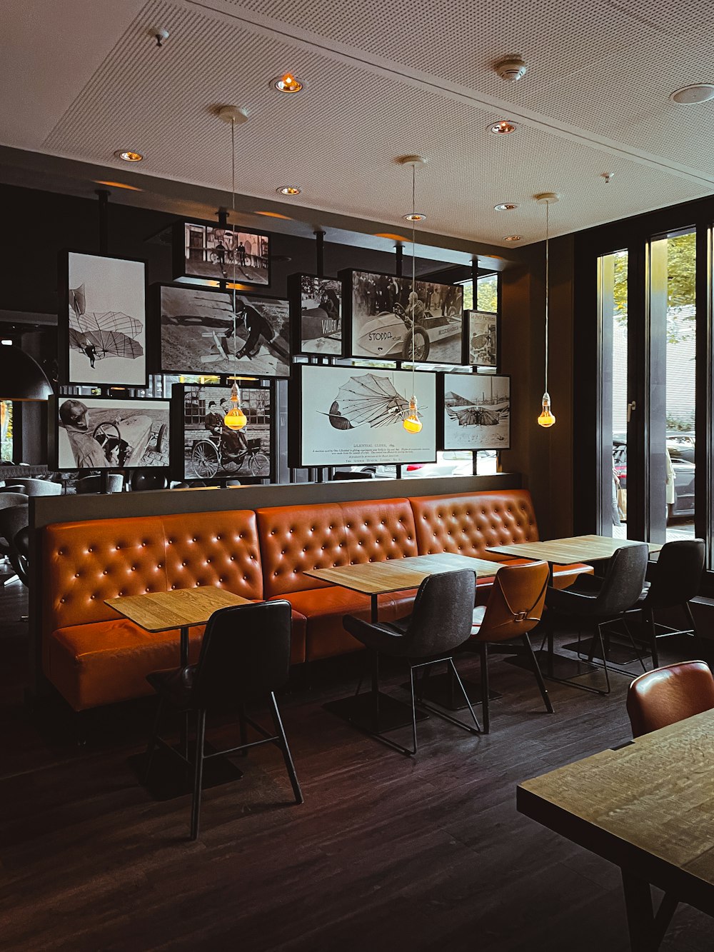 a restaurant with a lot of tables and chairs