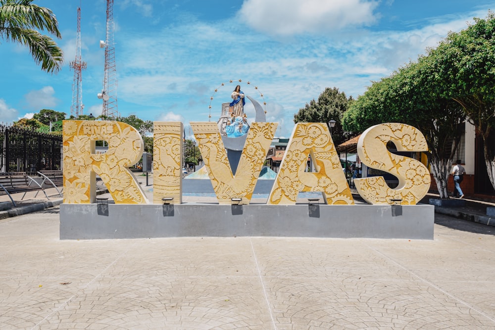 a sign that says rva in front of a blue sky