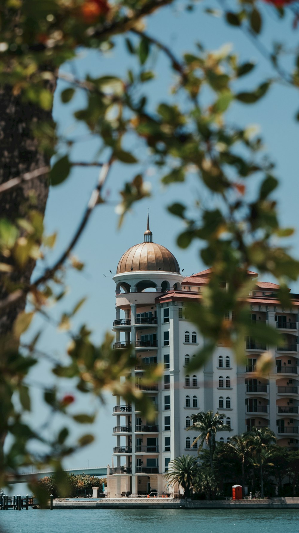 a view of a building from across the water