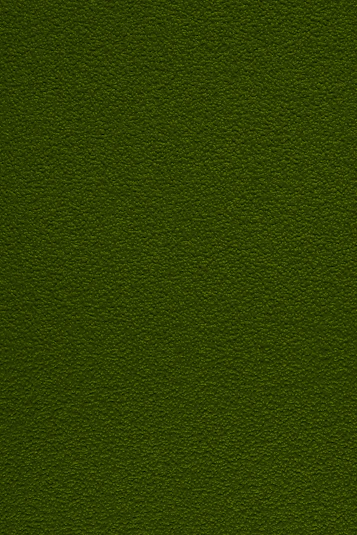 a close up of a green surface with a small patch of grass