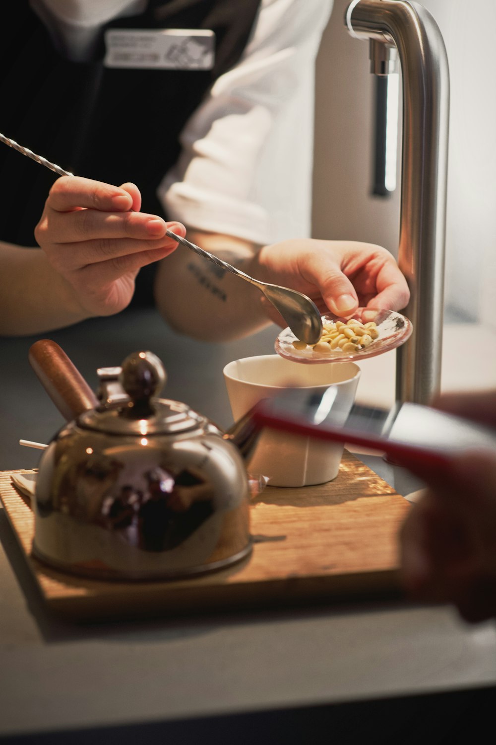 a person is preparing a bowl of food