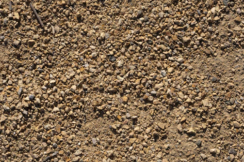Close-up of gravel areas with clean, well-drained surfaces preventing weed growth.