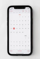 A calendar on a smartphone screen showing booked appointment slots with Amanda Mamoni.