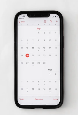 Close-up of a digital calendar showing automated appointment scheduling for a handyman.