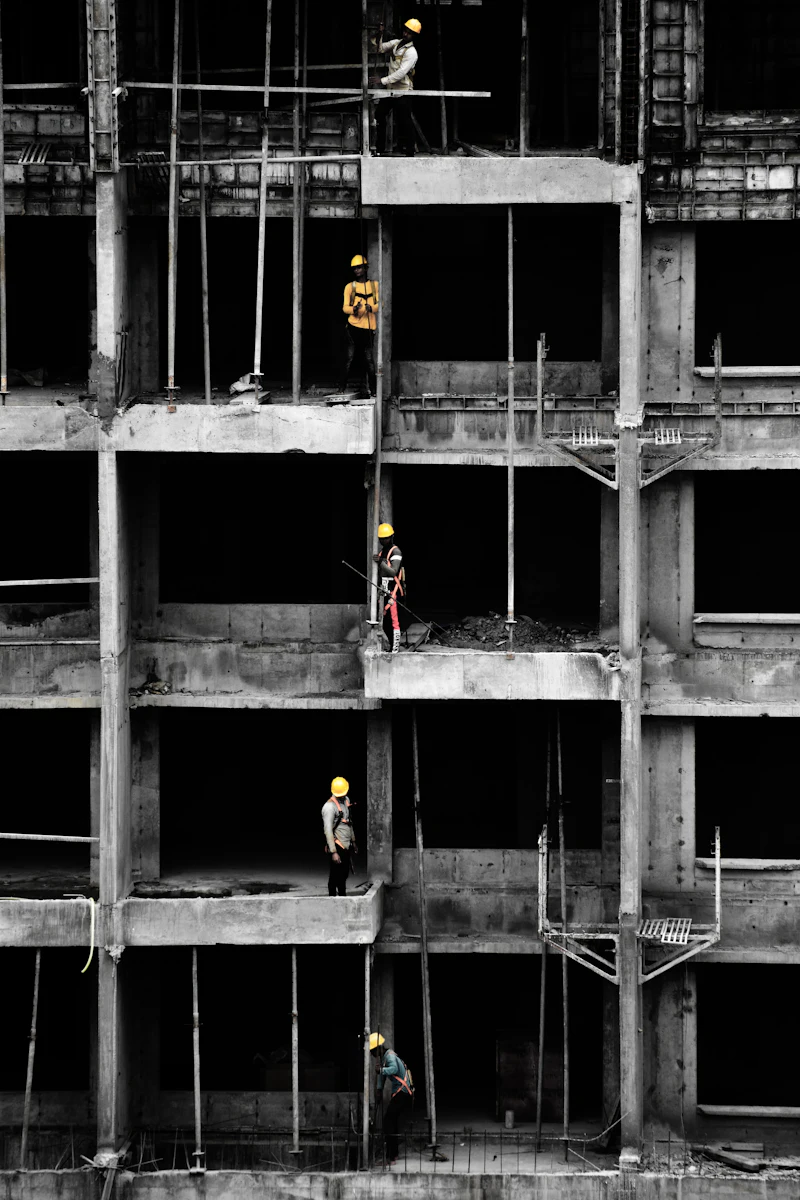 Aerial view of an Indian construction site during structural work