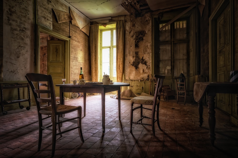 a dining room table in front of a window