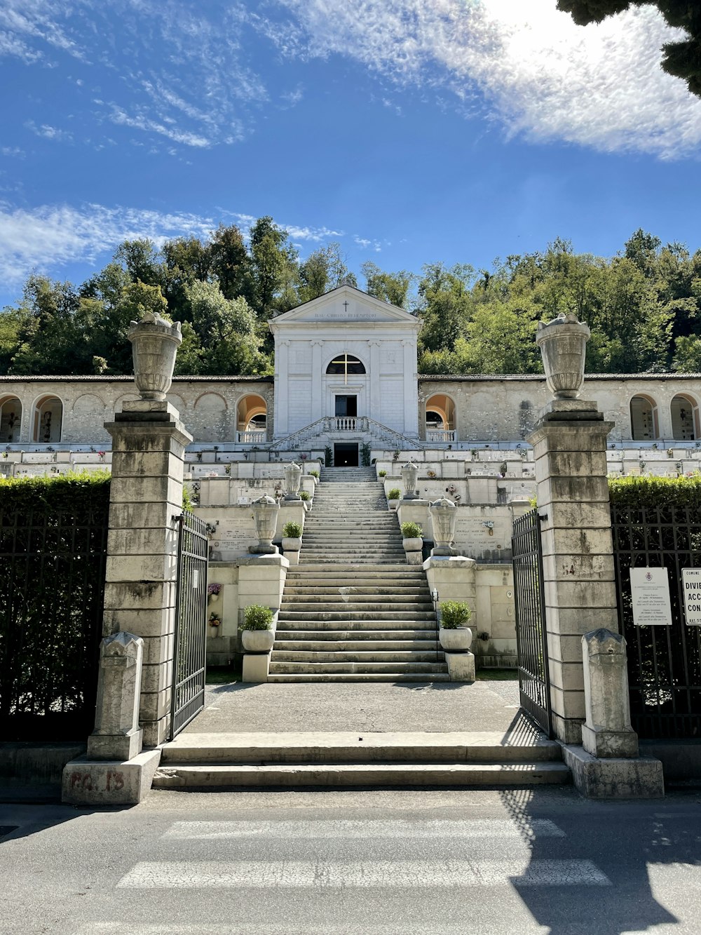 a large white building with stairs leading up to it