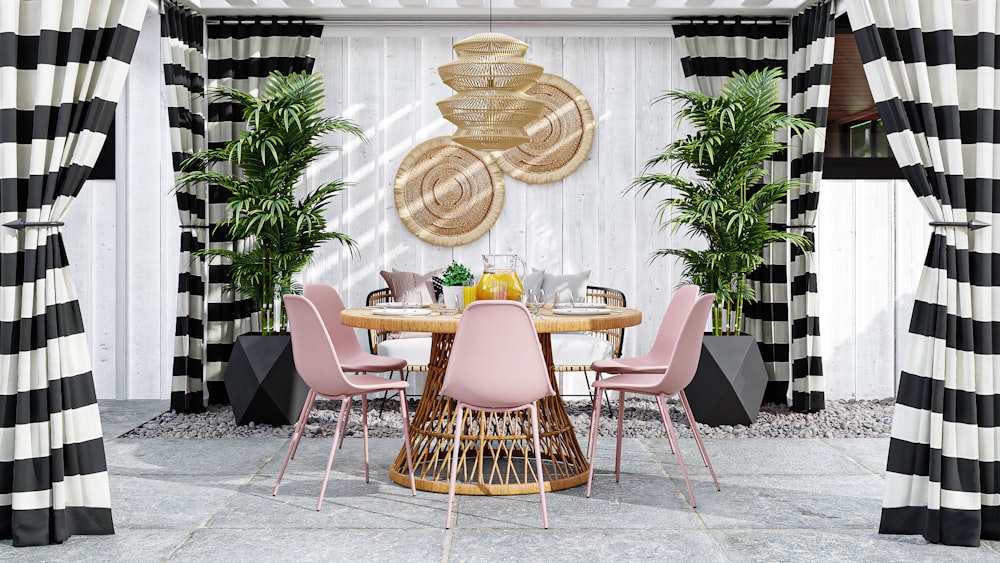 a dining room with black and white striped curtains