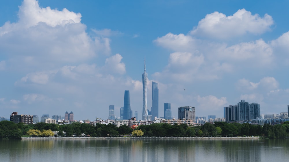 a large body of water with a city in the background