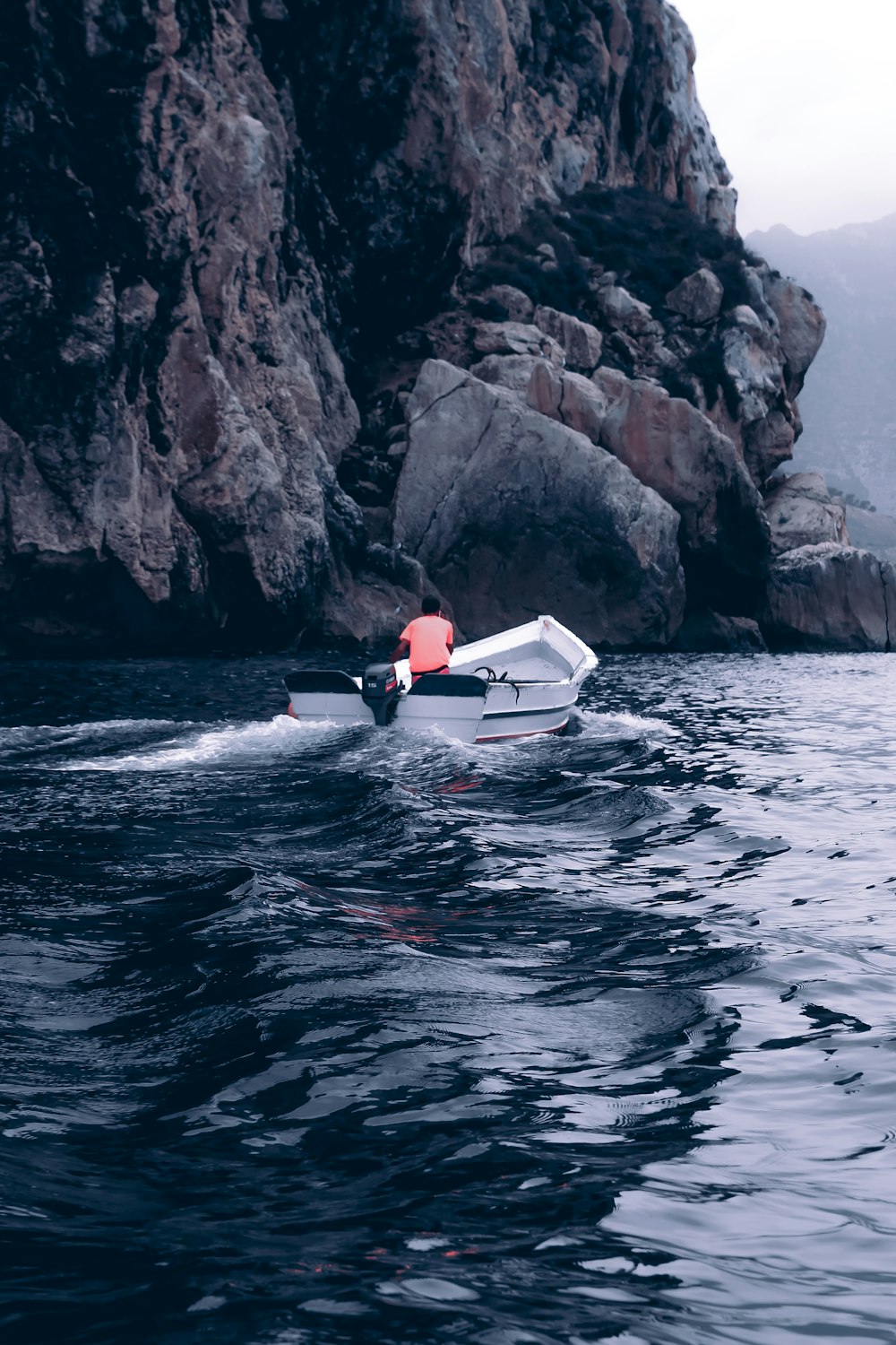 a small boat in a body of water