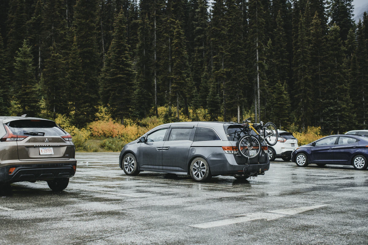 a couple of cars parked in a parking lot